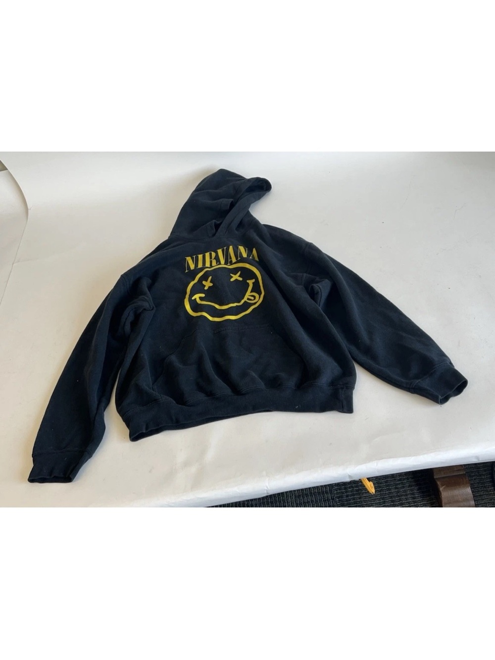 NIRVANA Black Pullover Hoodie with Yellow Smiley Graphic
